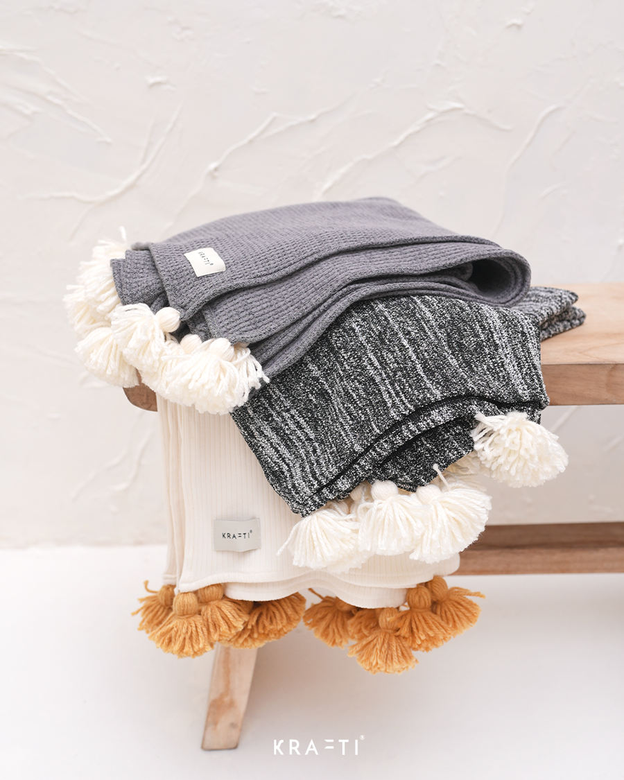 Malie Throw Blanket
